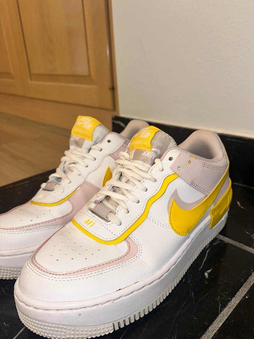 Nike Air Low-Top Leather Sneakers in White and Yellow